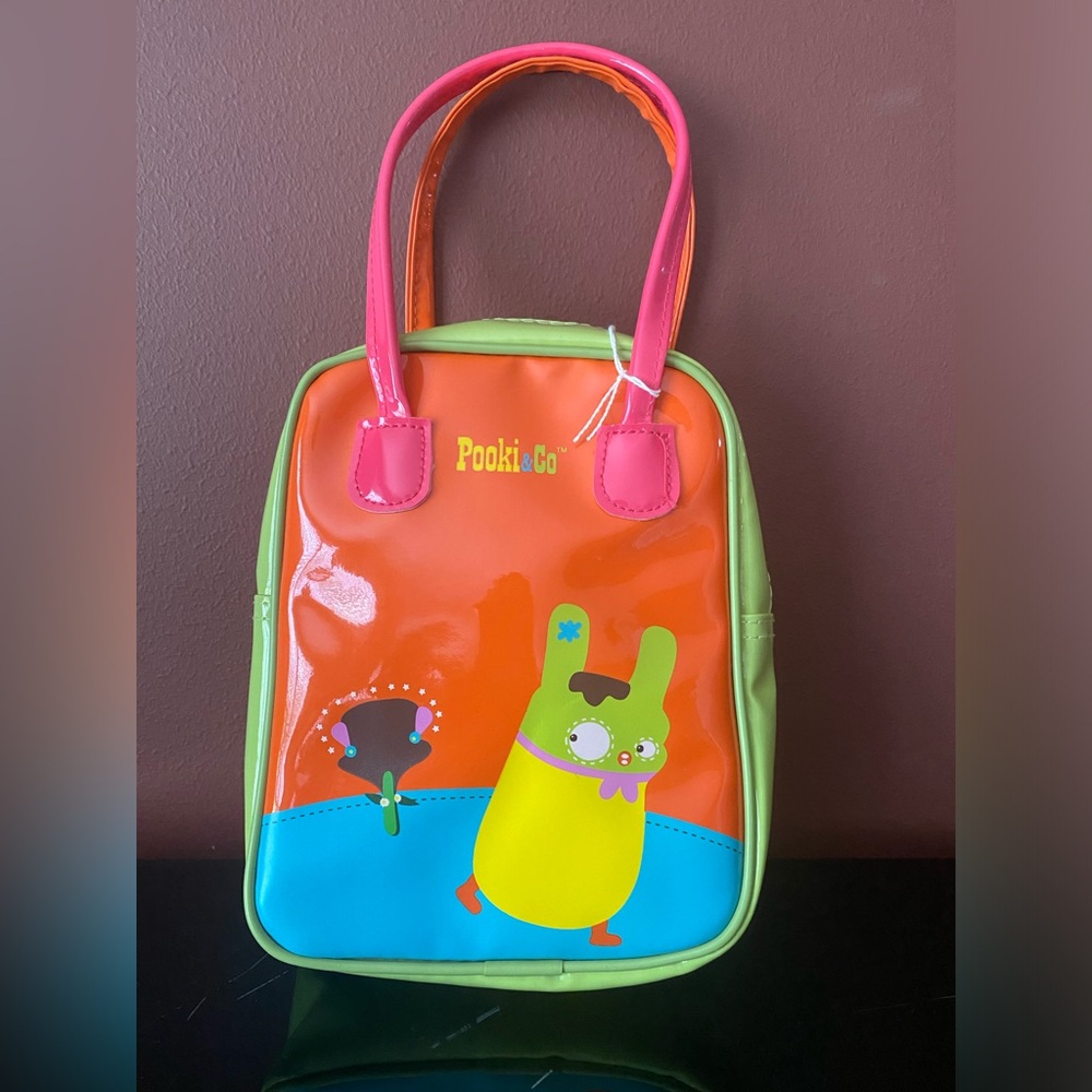 Pooki & Co. Pookiland orange, pink with green sides mini hand bag New